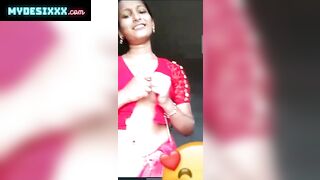 Beautiful slim girl in saree showing her tight boobs