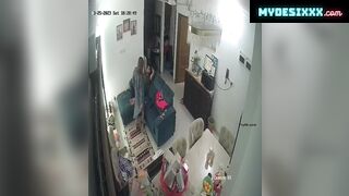 Couple having on couch caught in cctv