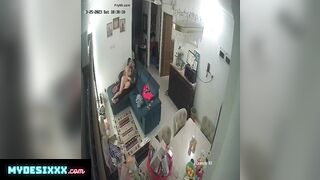 Couple having on couch caught in cctv