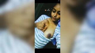 Young beautiful babe pressing her big boobs