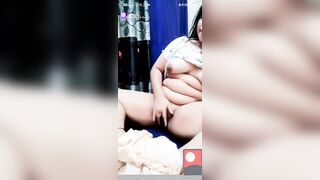 Horny girl pressing big boobs and fingering wet pussy