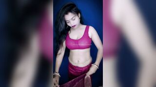 Sexy model wear red saree front of camera