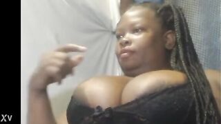 Ebony milf showing big boobs